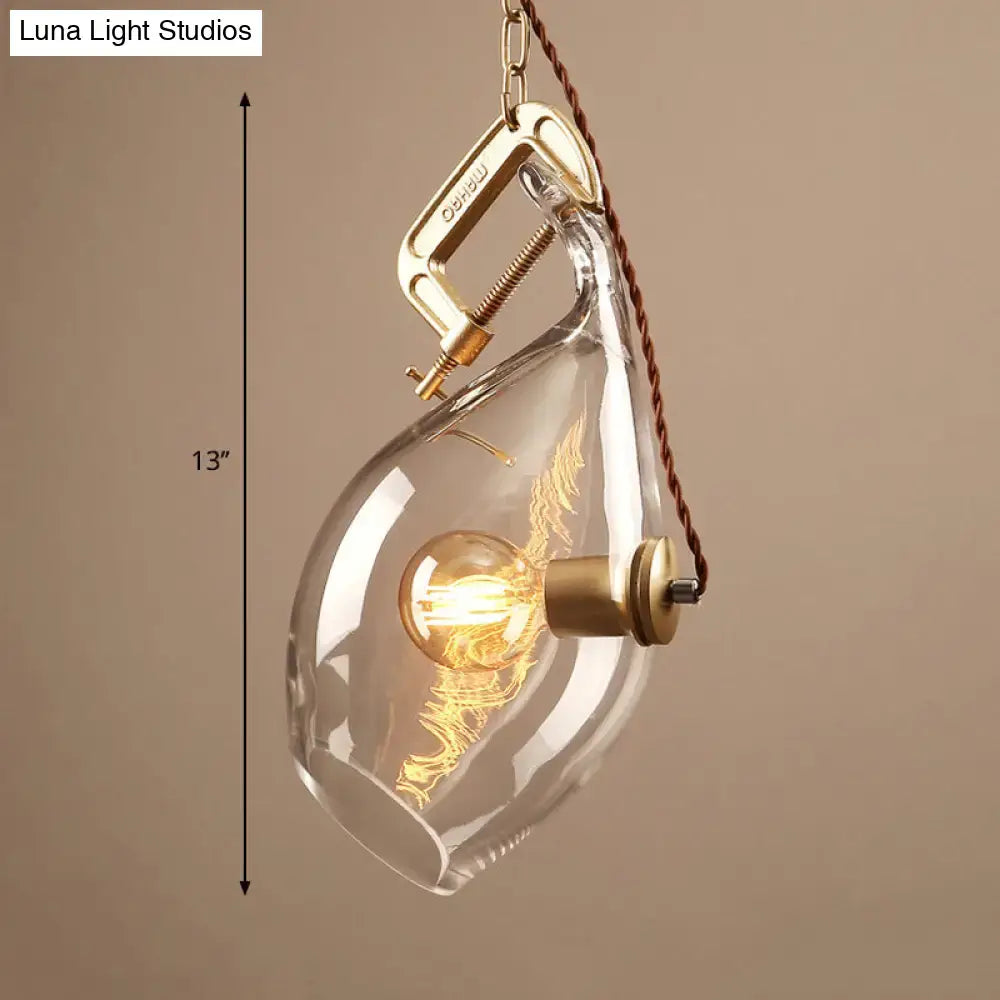 Modern brass and clear glass fish pendant light dining room