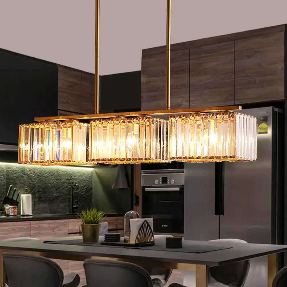 Modern gold linear chandelier with clear cuboid crystal dining room