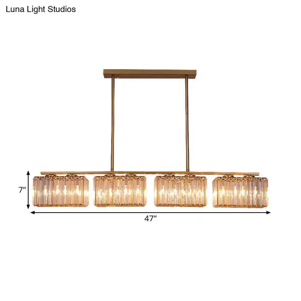 Modern gold linear chandelier with clear cuboid crystal dining room