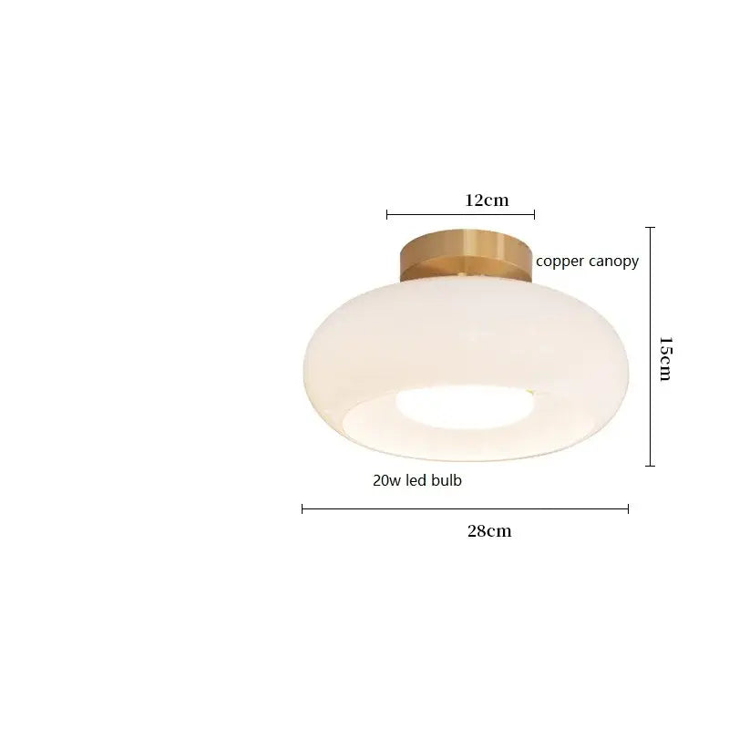 Sleek amber glass and copper pendant light for kitchens