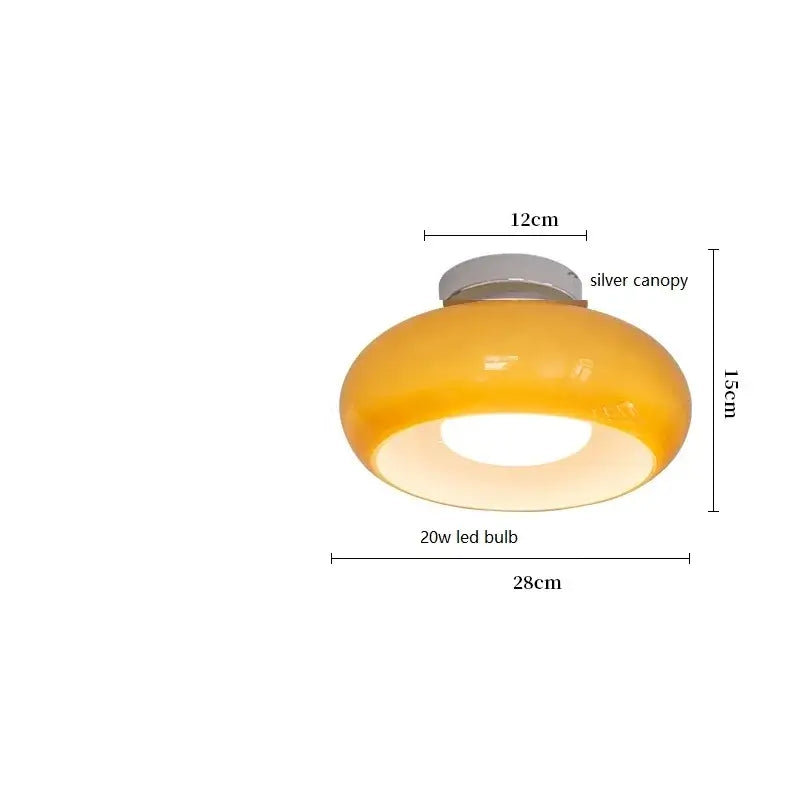 Sleek amber glass and copper pendant light for kitchens
