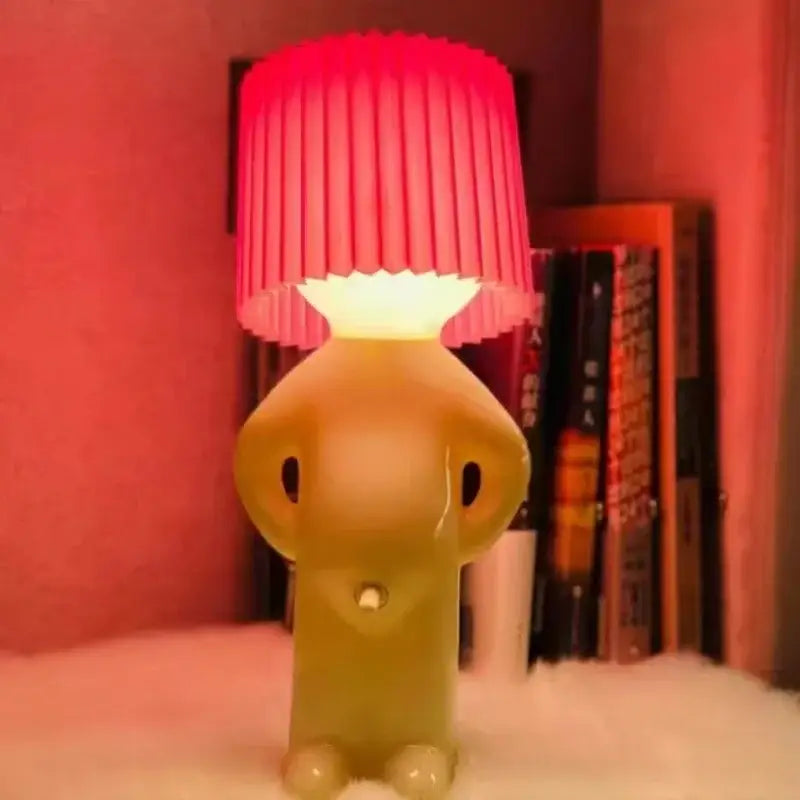 Whimsical beige and yellow naughty boy table lamp for bedroom bedside