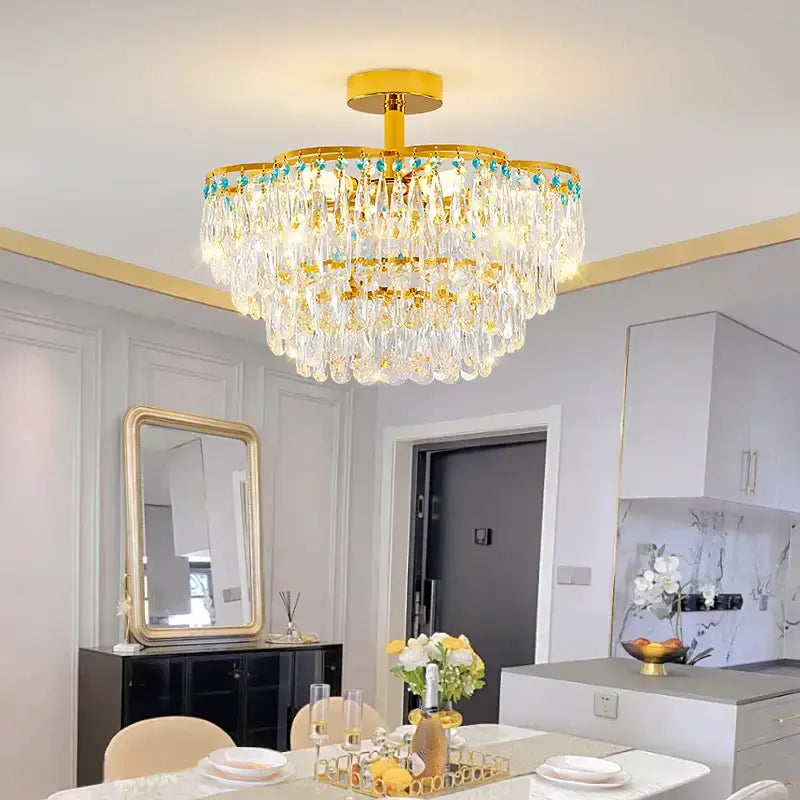 Post-modern gold and turquoise crystal light chandelier dining room