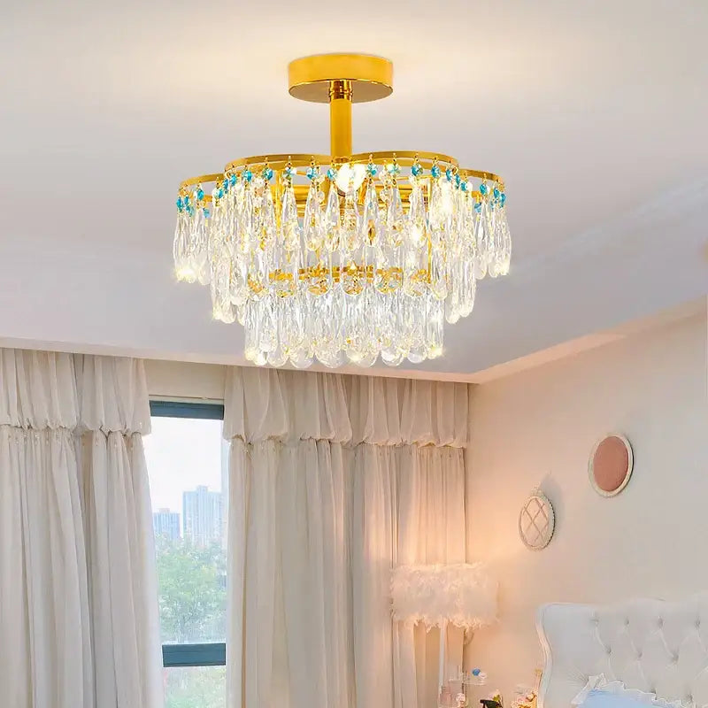 Post-modern gold and turquoise crystal light chandelier dining room