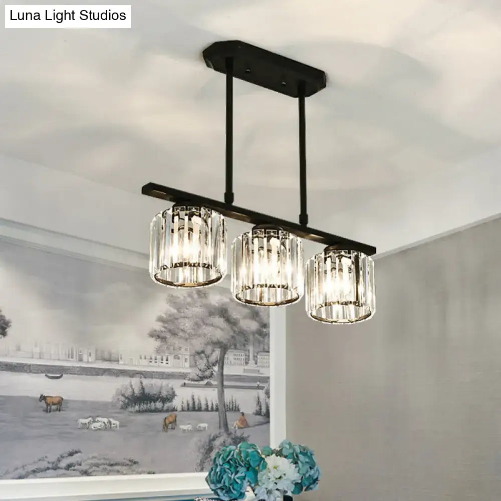 Simple black metal chandelier with three crystal shades dining room