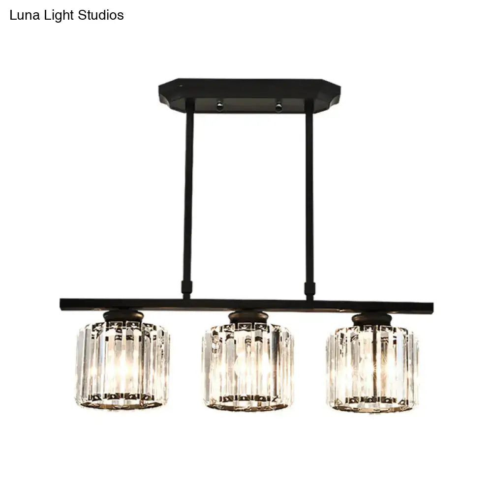 Simple black metal chandelier with three crystal shades dining room