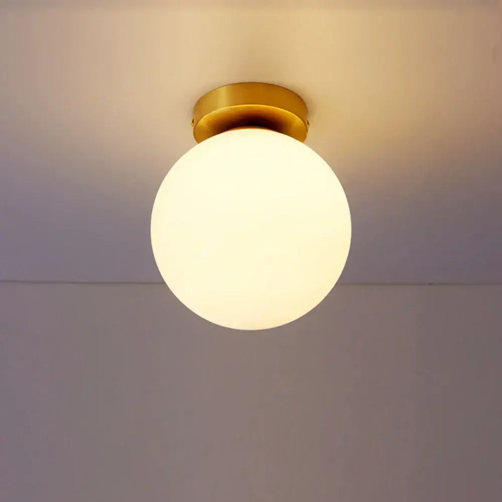Modern brass glass ball ceiling light for bedroom decor