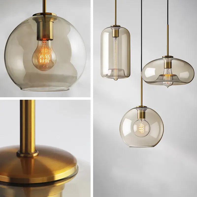 Modern smoked glass pendant lights with brass accents for kitchen island