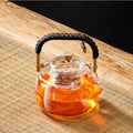 Modern glass tea pot with weave handle – kitchen steaming kettle