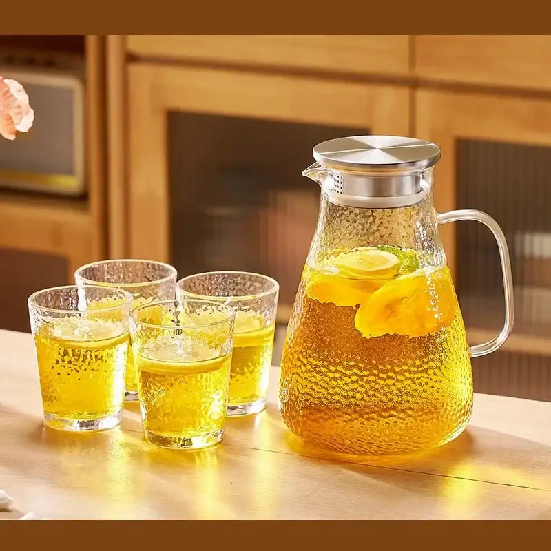 Hammered glass tea set with silver lid jug and cups for dining room