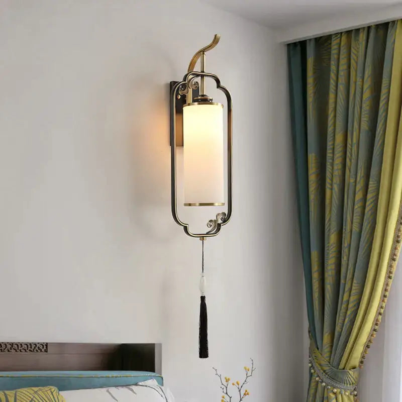 Ornate brass glass wall lamp for living room with frosted shade