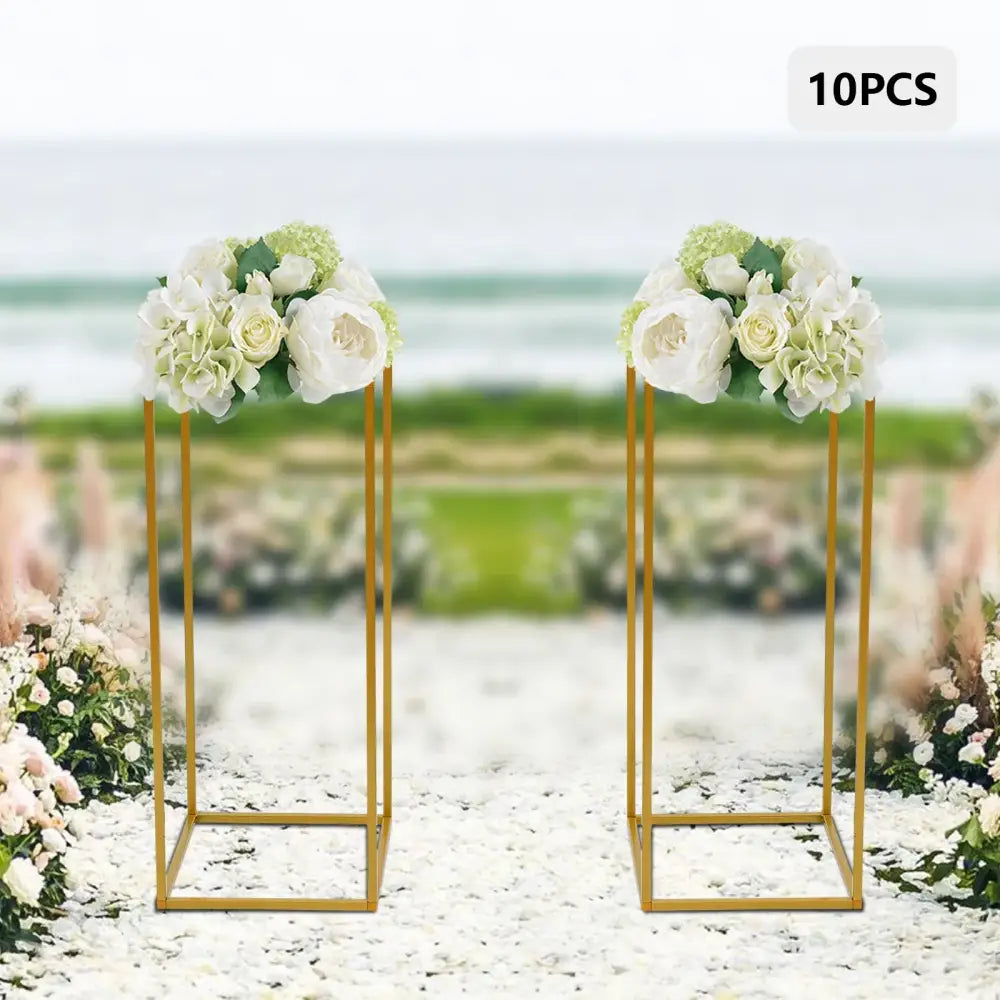 Gold metal wedding flower stand set with pink roses for dining room