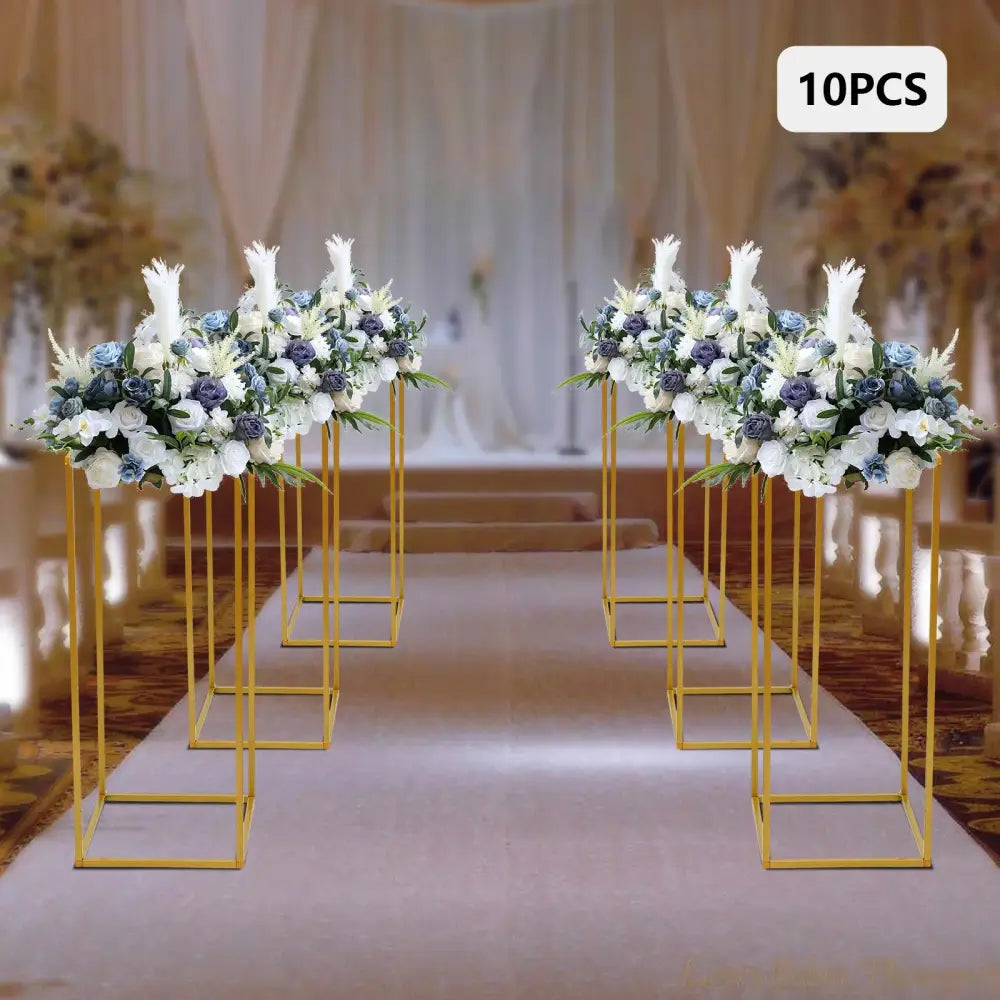 Gold metal wedding flower stand set with pink roses for dining room