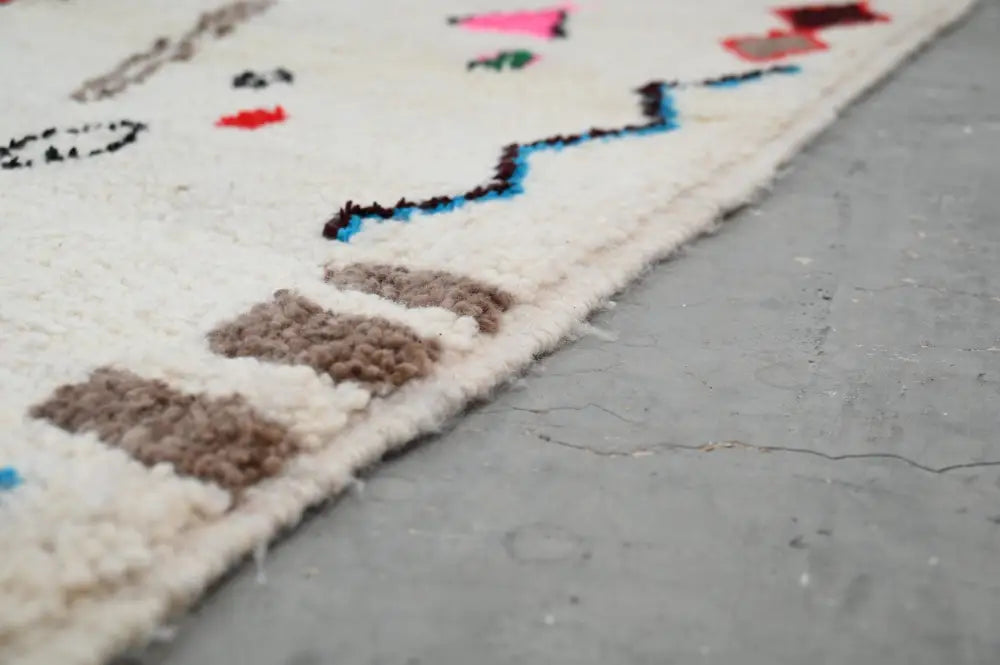 Handmade beige geometric azilal rug – bedroom natural wool decor