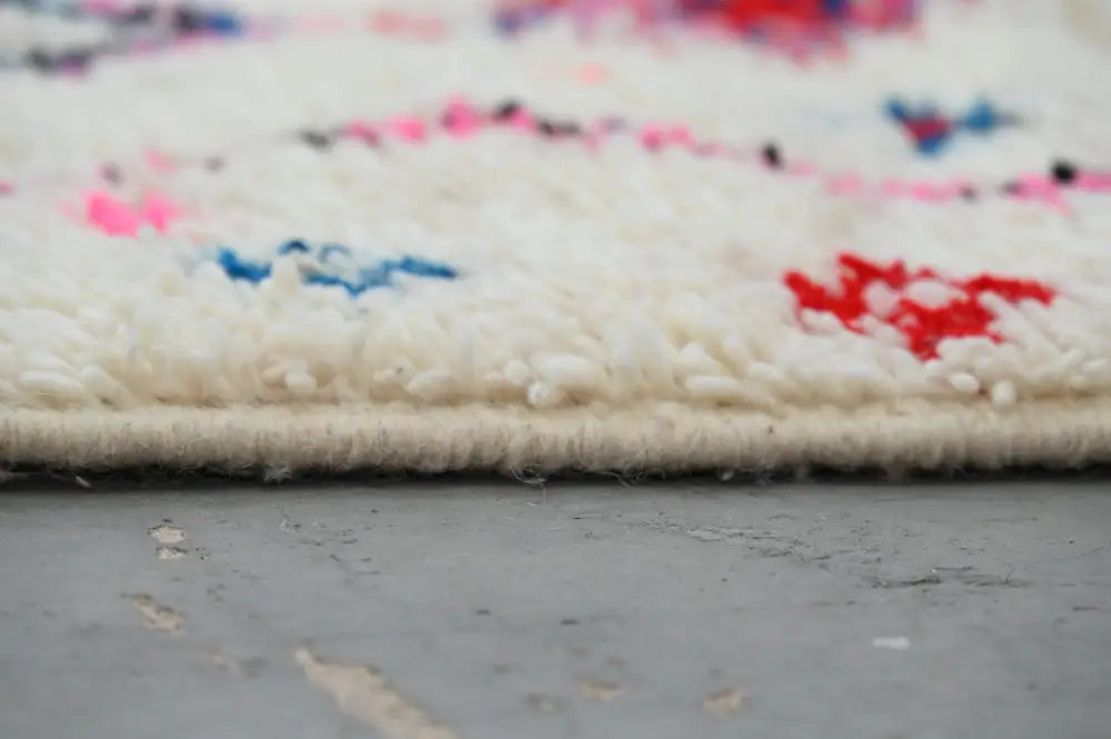 Handmade traditional azilal rug beige and pink bedroom decor