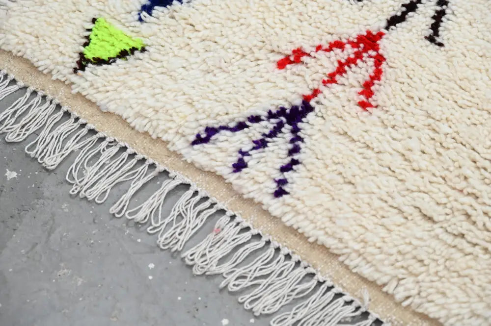 Handmade beige geometric moroccan azilal rug bedroom decor