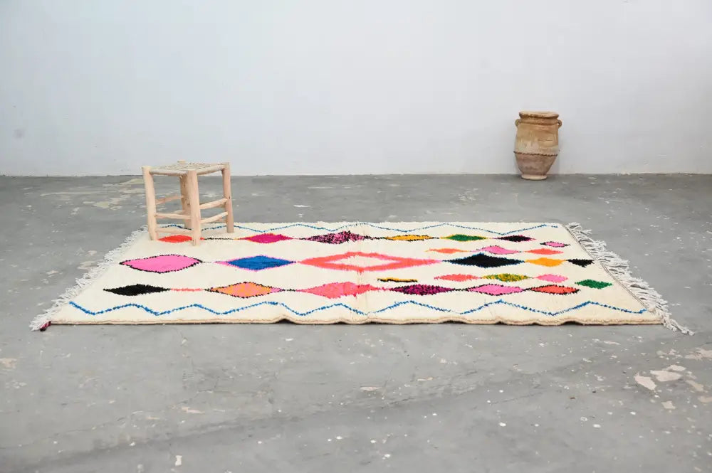 Handmade moroccan azilal rug with vibrant colors for living room