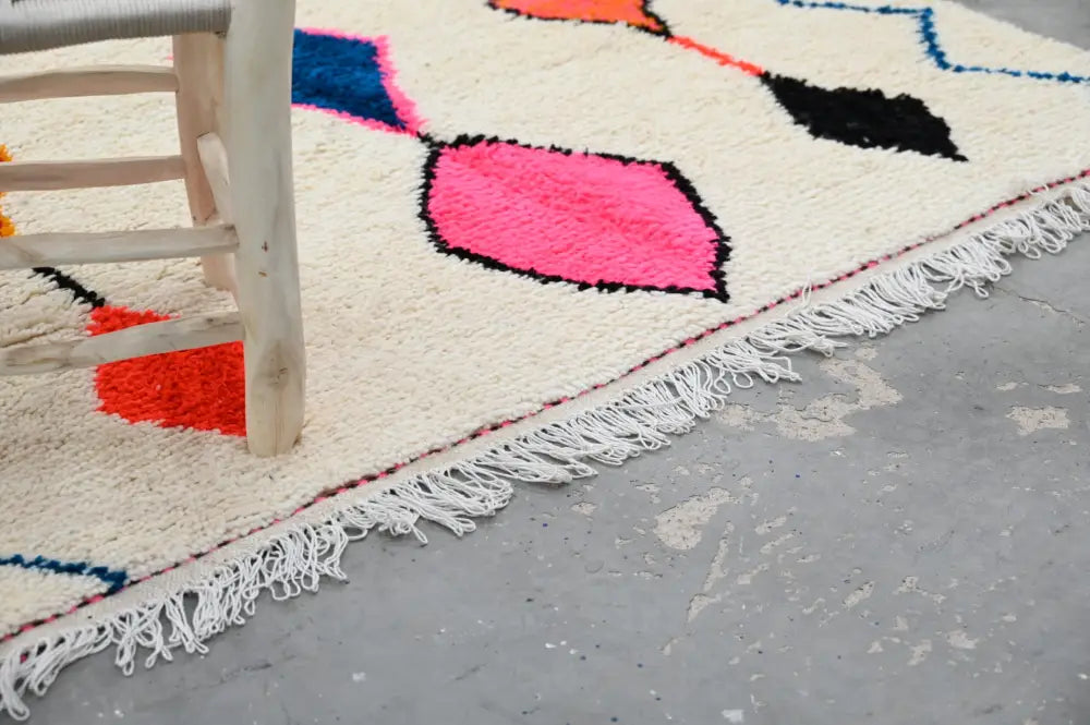 Handmade moroccan azilal rug with vibrant colors for living room