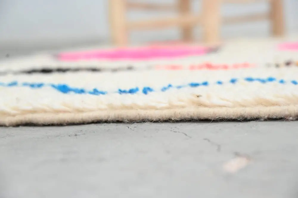 Handmade moroccan azilal rug with vibrant colors for living room