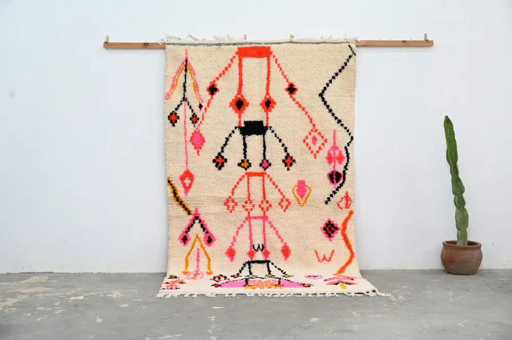 Handmade moroccan azilal rug beige and pink living room decor