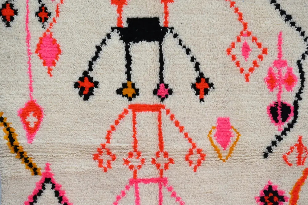 Handmade moroccan azilal rug beige and pink living room decor