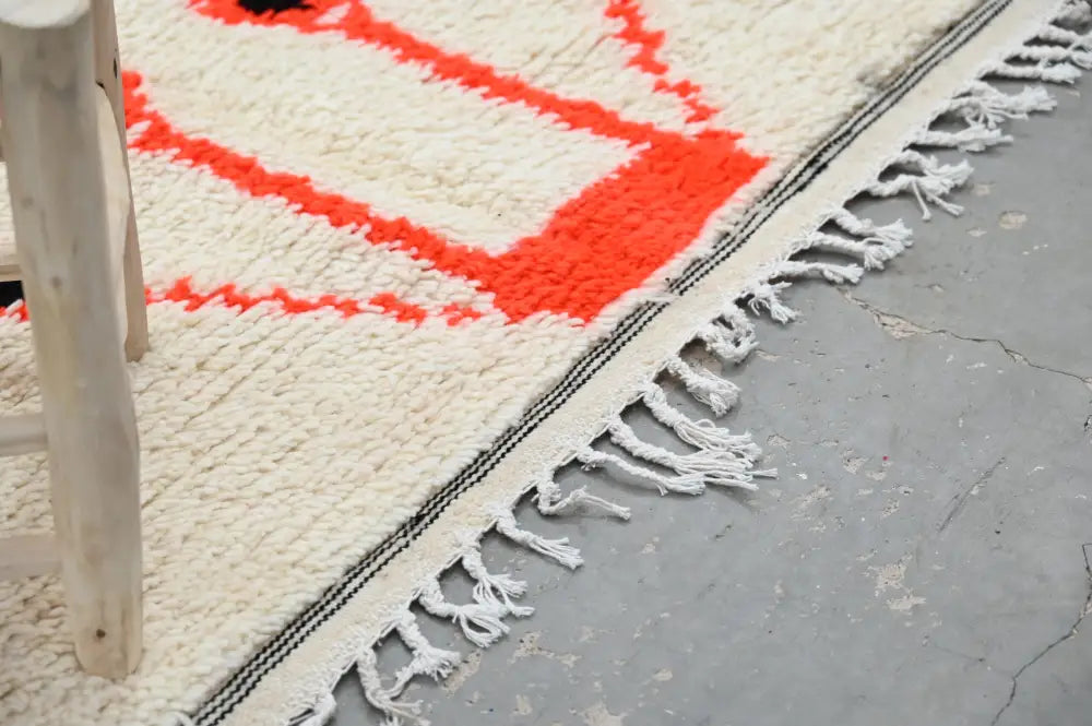 Handmade moroccan azilal rug beige and pink living room decor