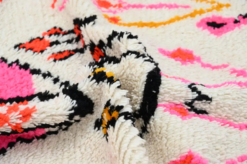 Handmade moroccan azilal rug beige and pink living room decor