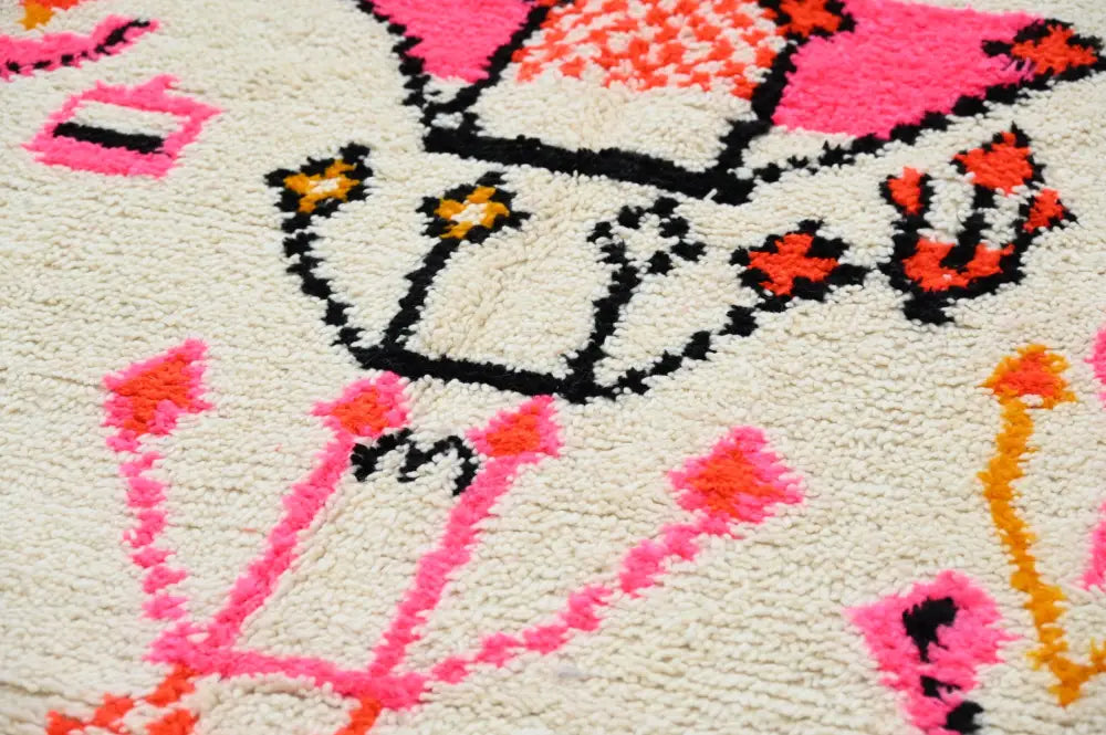 Handmade moroccan azilal rug beige and pink living room decor