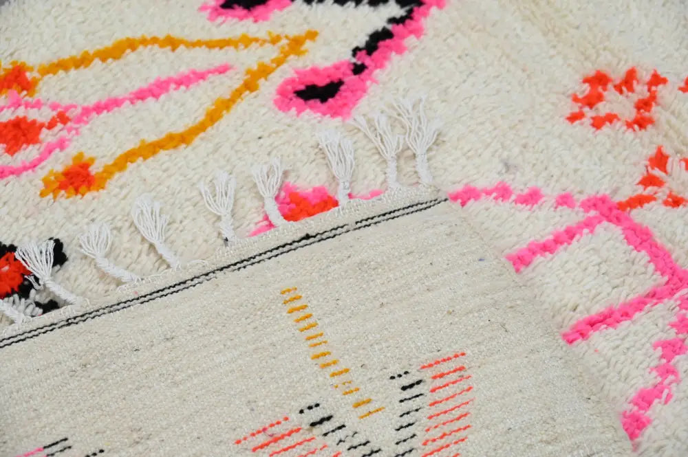 Handmade moroccan azilal rug beige and pink living room decor