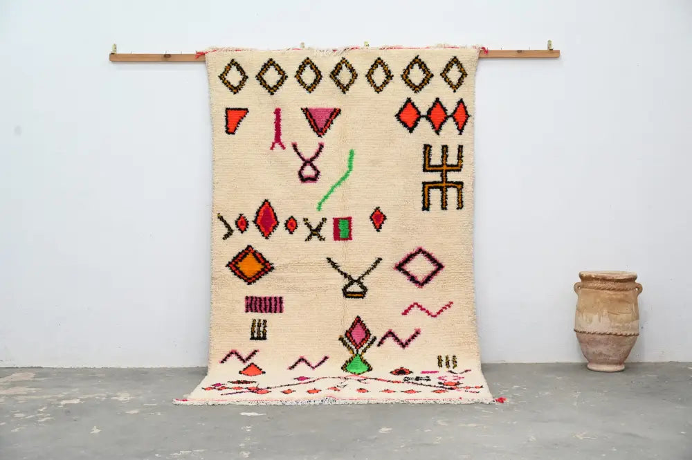 Handmade moroccan azilal rug beige and red living room decor