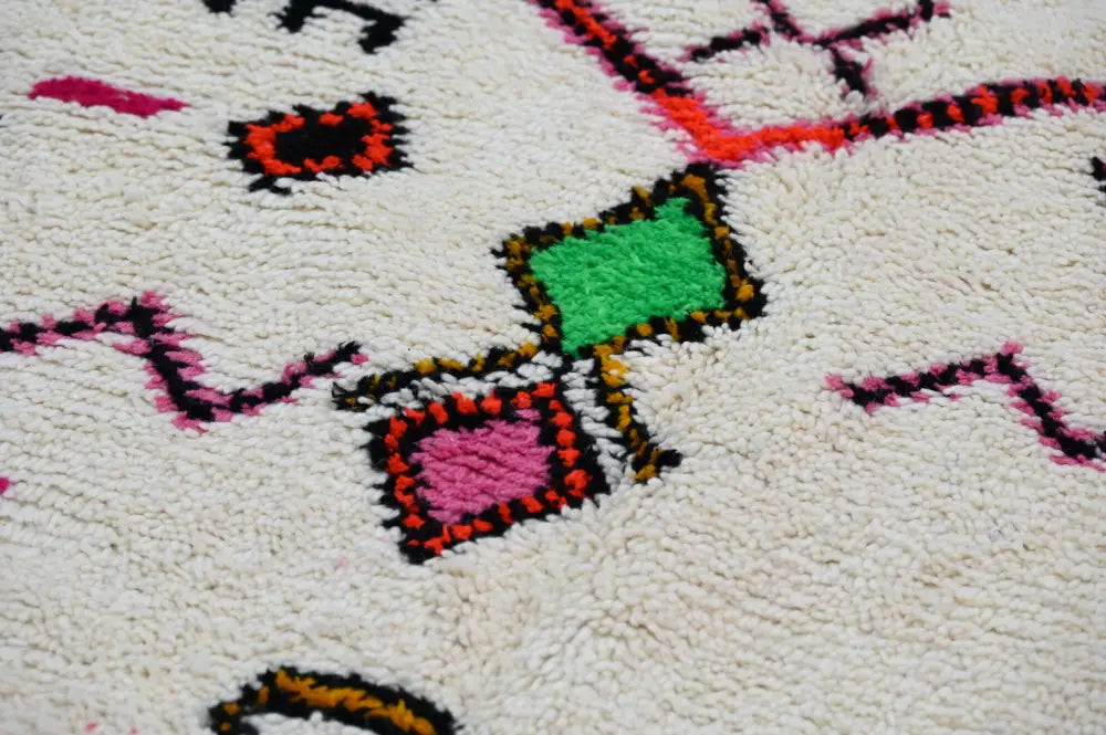 Handmade moroccan azilal rug beige and red living room decor