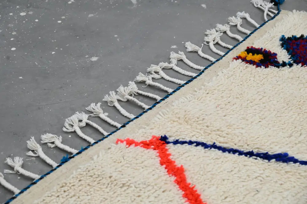 Handmade traditional azilal rug beige and orange bedroom decor