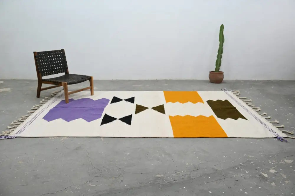 Handmade moroccan azilal beige and orange rug bedroom decor