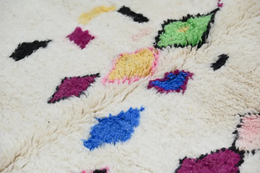 Vibrant cream handmade moroccan azilal rug living room decor