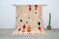 Handmade moroccan azilal rug with vibrant colors for living room