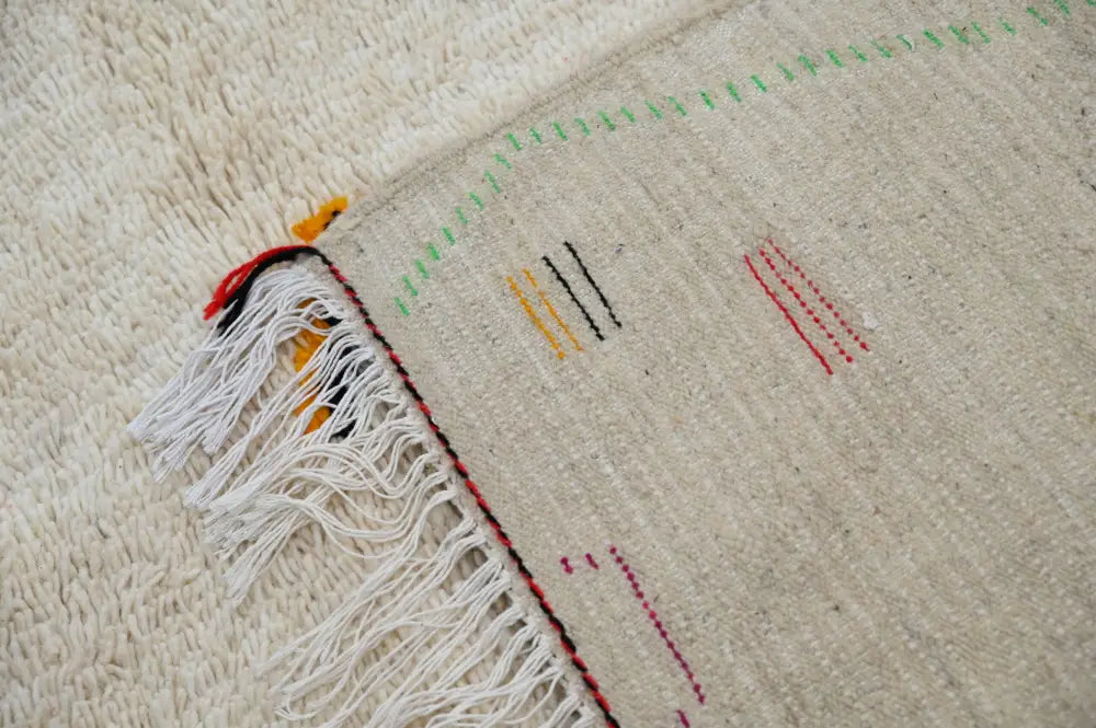 Handmade moroccan azilal rug with vibrant colors for living room