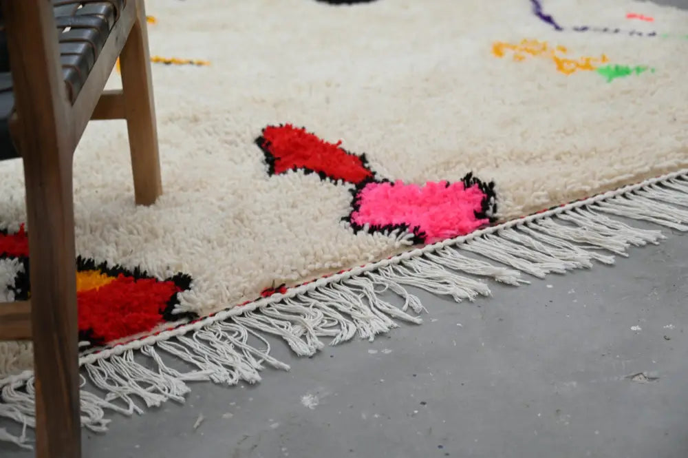 Handmade moroccan azilal rug with vibrant colors for living room