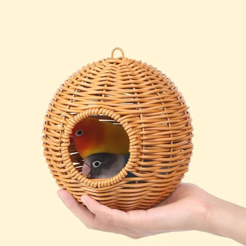 Handwoven grass bird cage hut with heart entrance for garden