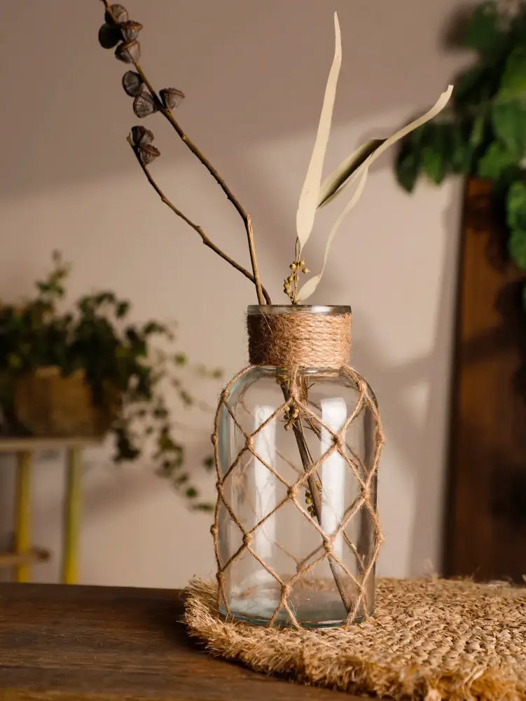 Rustic hanging glass vase with hemp rope twine netting – living room