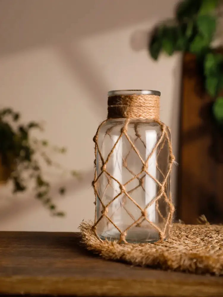 Rustic hanging glass vase with hemp rope twine netting – living room