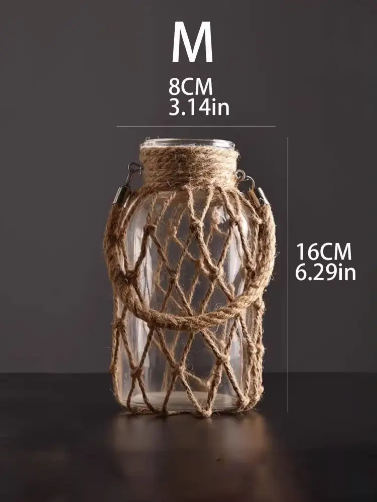 Rustic hanging glass vase with hemp rope twine netting – living room