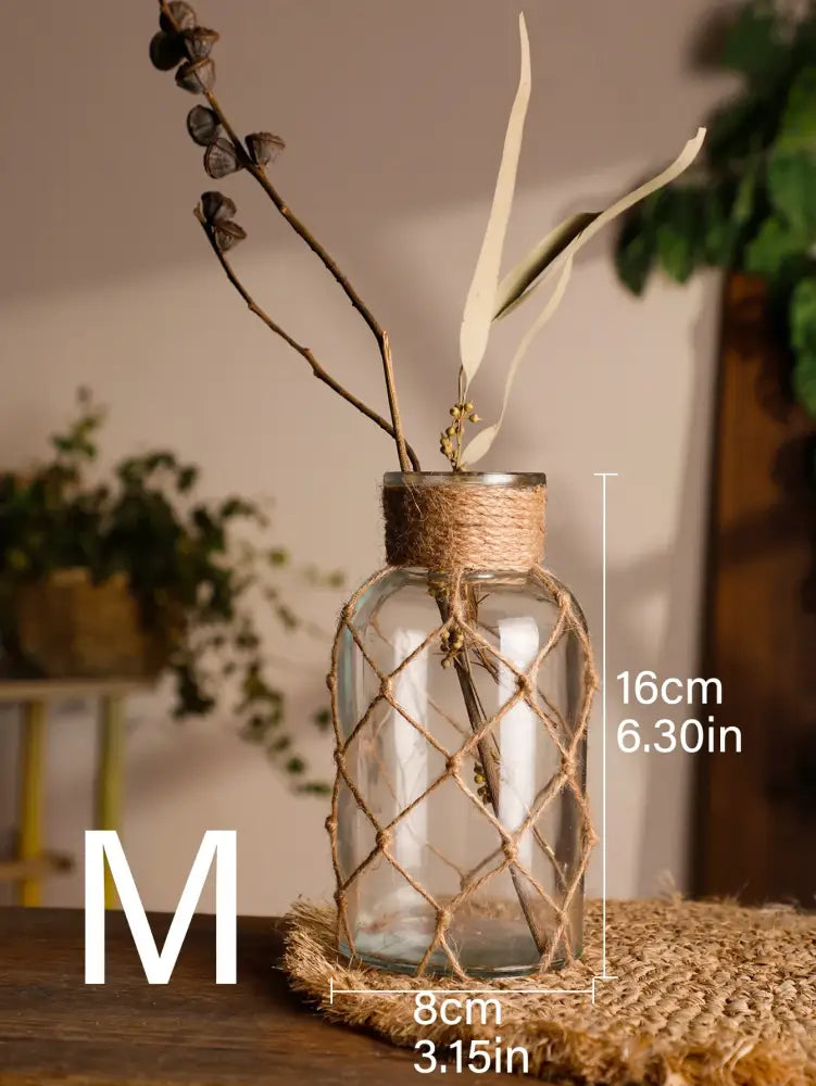 Rustic hanging glass vase with hemp rope twine netting – living room