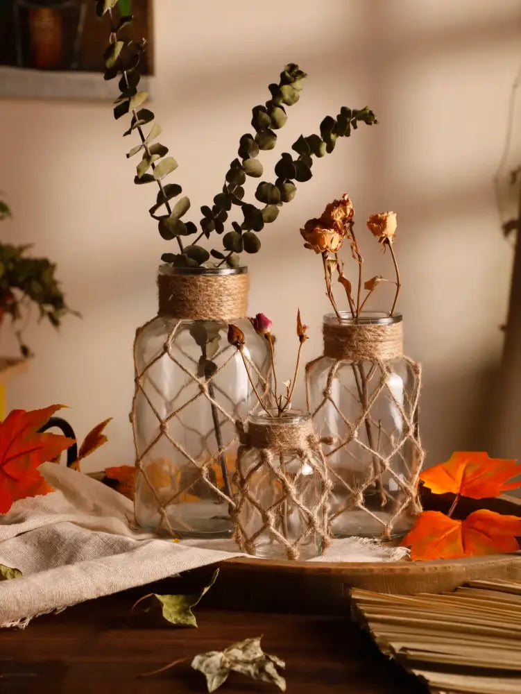 Rustic hanging glass vase with hemp rope twine netting – living room