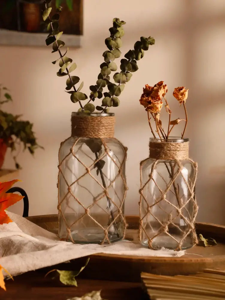 Rustic hanging glass vase with hemp rope twine netting – living room