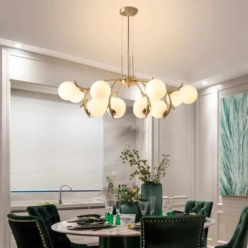 Organic gold led chandelier lighting with frosted globes for dining room