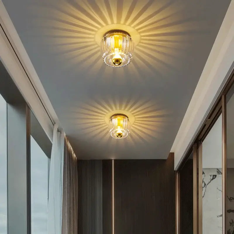 Modern gold and clear faceted led indoor glass wall sconce living room