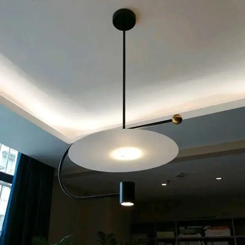 Modern minimalist gray and black pendant light fixture dining room