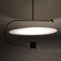 Modern minimalist gray and black pendant light dining room