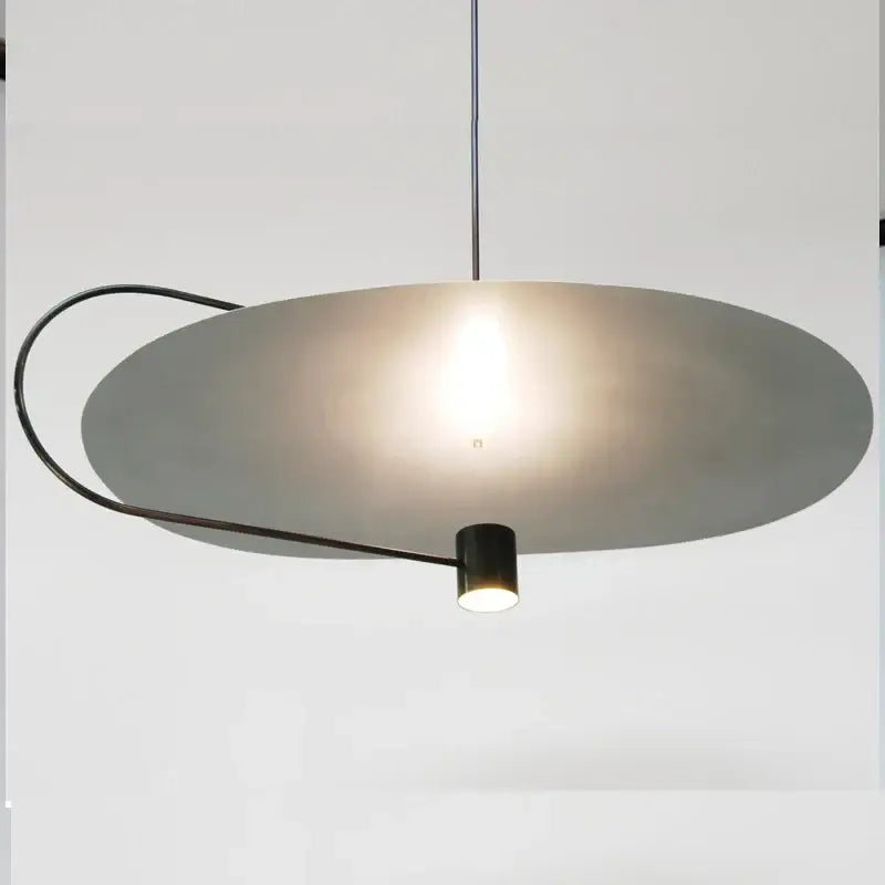 Modern minimalist gray and black pendant light dining room