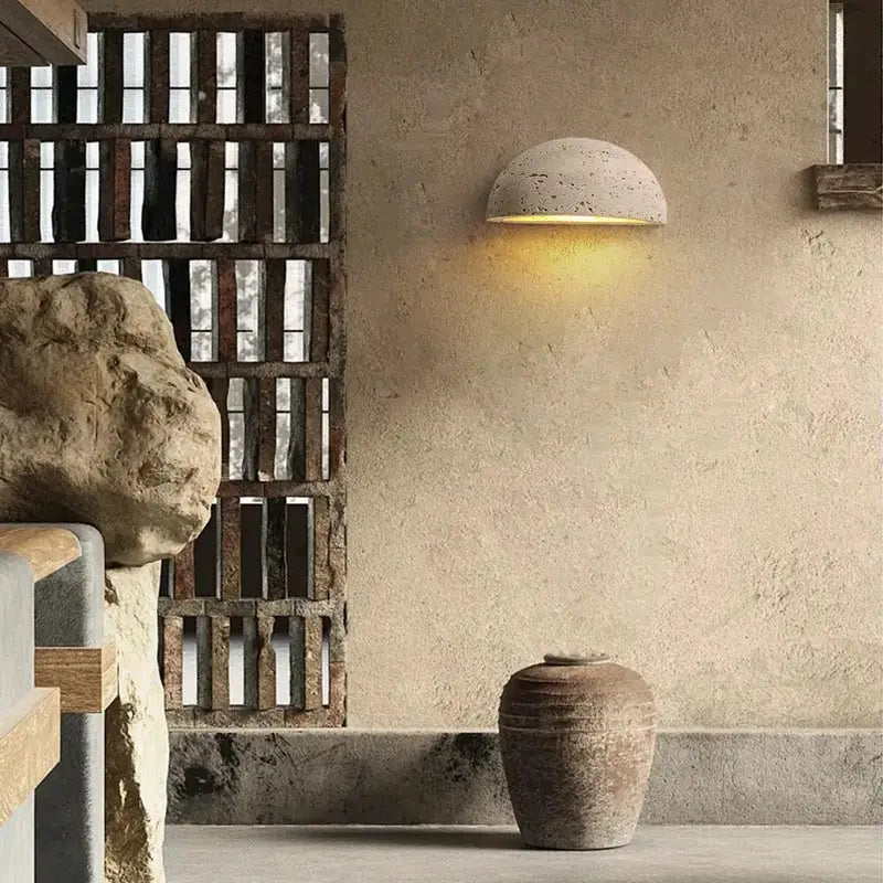 Textured travertine wall light – porch warm yellow sconce
